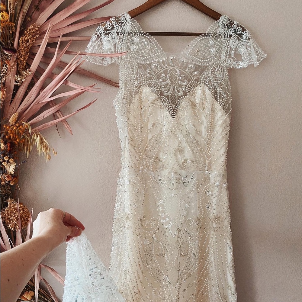 Bespoke Beaded Kāla Noel Wedding Dress